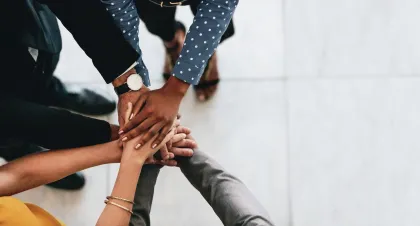 Hands in for a huddle