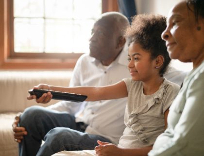 Girl using remote