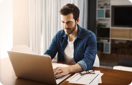 Man checking his Breezeline Internet plan details on a laptop