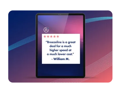 A tablet displaying a 5-star review from William M. praising Breezeline for higher speeds at a much lower cost.